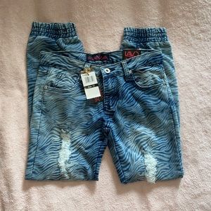 Girls size 12 zebra stripped Jeans
